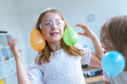 Can static electricity pop a balloon?